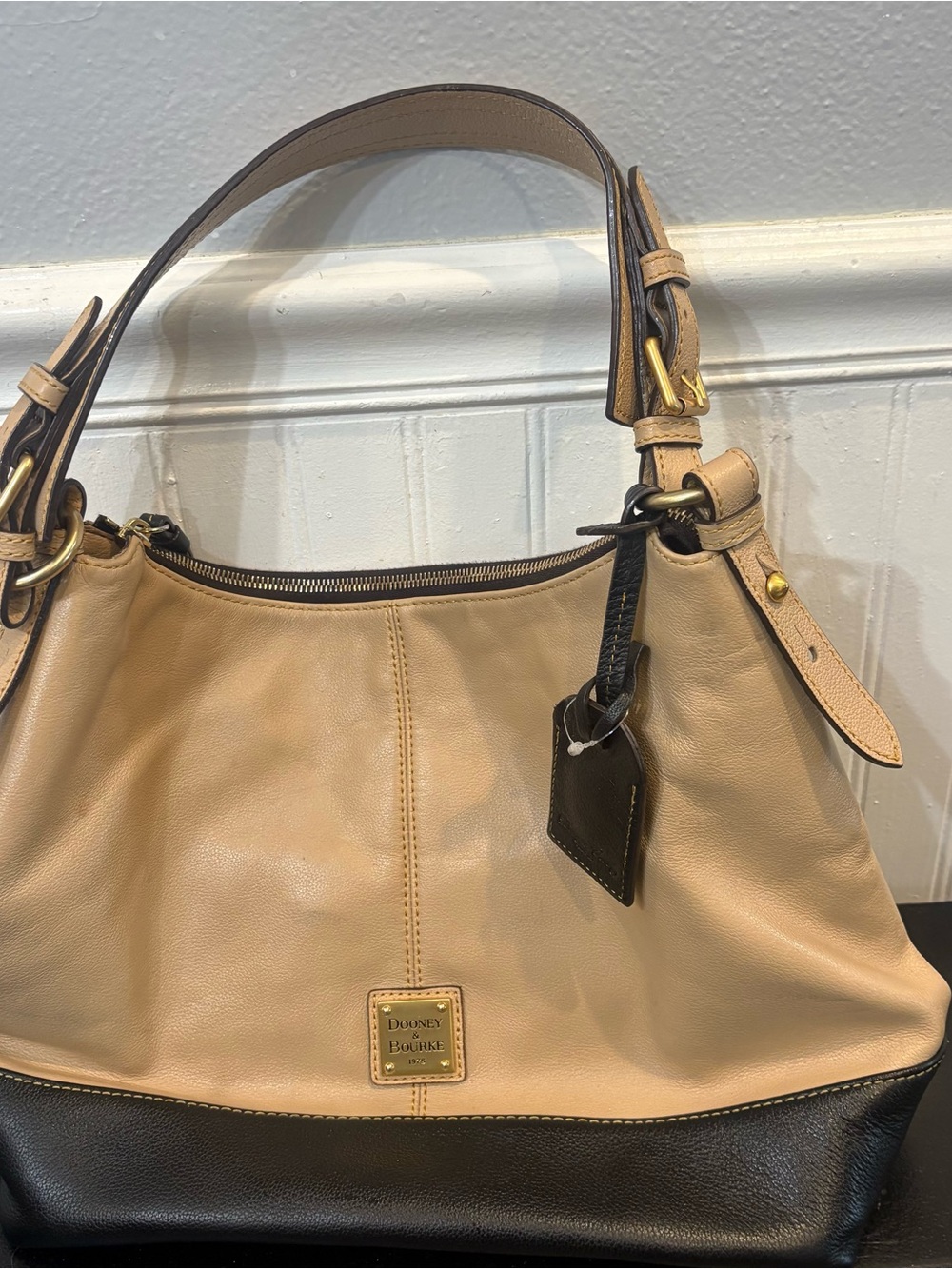 Purse interior is peeling action is in good condition